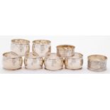 A set of six George V silver napkin rings, marks rubbed, Birmingham 1918 and two others, 3ozs 13dwts