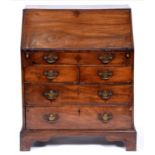 A George III mahogany bureau, with stepped oak interior and well, 87cm h; 42 x 68cm Damage and old