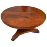 An early Victorian mahogany  breakfast table, the figured  top  on octagonal baluster pillar with