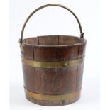 A brass bound oak coal bucket with brass handle, early 20th c, 27cm h excluding handle Polish