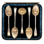 Four silver tablespoons and a sauce ladle, George III-Victorian, later chased and gilt as a 'set' of