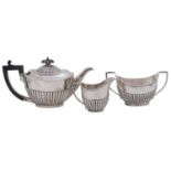 A Victorian silver bachelor's tea service, teapot 11cm h, by The Goldsmiths & Silversmiths Co,