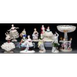 Two pairs of Sitzendorf and four other German porcelain figures, including a group, 20th c and a