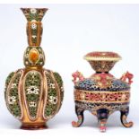 A Zsolnay gilt ground double walled, reticulated vase and a Zsolnay reticulated four footed vase,