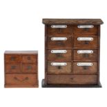 A set of oak spice drawers, late 19th c, the oversailing top above eight short and one long