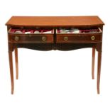 A bow centred and line inlaid mahogany serving table, c1930, in George III style, with fluted