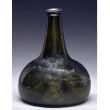 An English glass 'onion' bottle, 18th c, of black glass, 17.5cm h Two star cracks on widest part