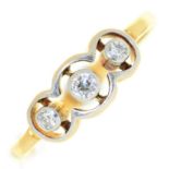 A three stone diamond ring, in gold marked 18ct, 2.8g, size T Wear consistent with age