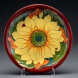 A Moorcroft Sunflower plate, 1994, 26cm diam, impressed and painted marks Good condition