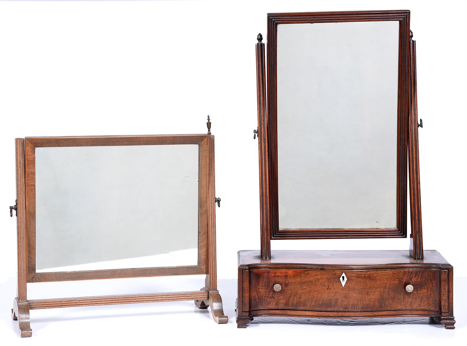 An Edwardian serpentine mahogany dressing mirror, with brass acorn finials, 65cm h; 21 x 44cm and