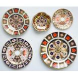 Ten Royal Crown Derby Imari and Old Derby Witches pattern plates and pin trays, late 20th c, 21cm