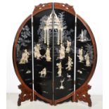 A South East Asian lacquer screen, black lacquer panels decorated with abalone, mother of pearl
