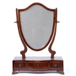 A Victorian mahogany and line inlaid dressing mirror, the shield shaped frame with bevelled plate,