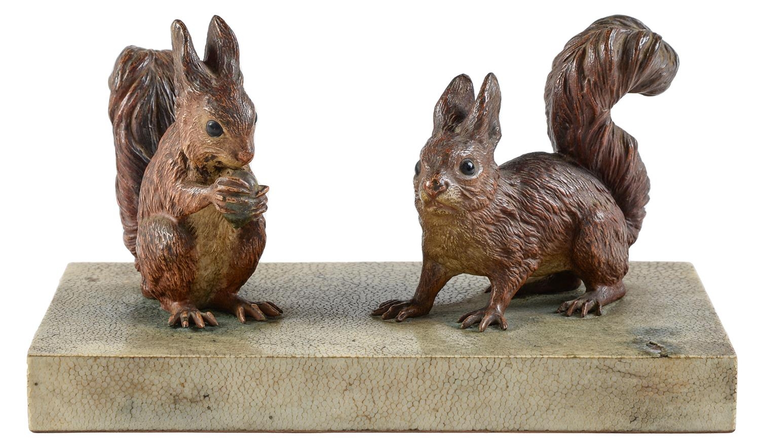 Two Viennese cold painted bronze sculptures of red squirrels, early 20th c,  mounted on shagreen