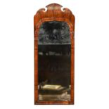 A Queen Anne walnut mirror, the bevelled rectangular and ogee upper plate in moulded surround, the
