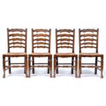 A set of four stained ash ladder back chairs, 19th c style, rush seated, seat height 45cm Handling