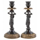 A pair of French parcel gilt bronze caryatid candlesticks, 19th c, 18cm h, stamped on iron bracket