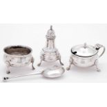 A George VI three piece silver condiment set, pepper caster 90mm h, by Edward Barnard & Sons Ltd,