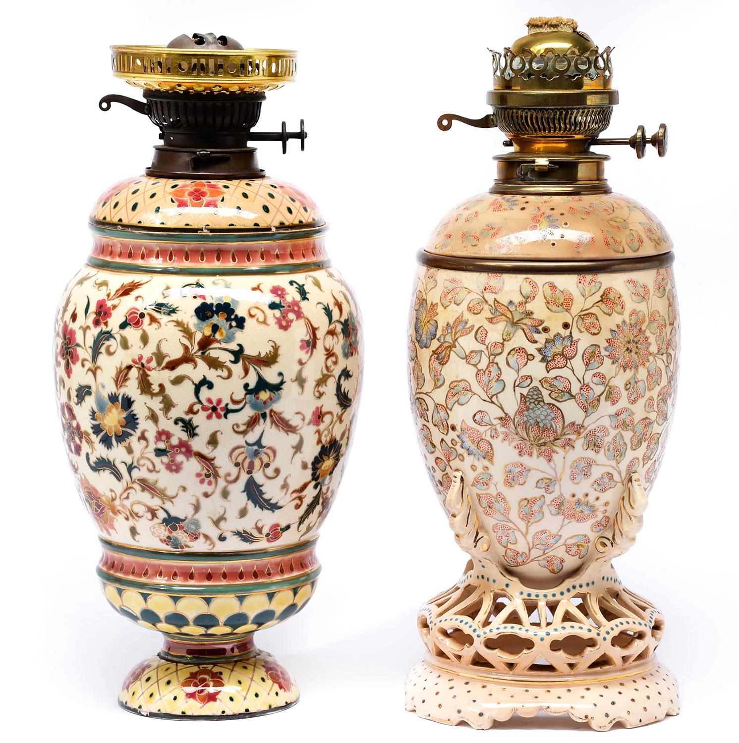 A Zsolnay oil lamp and base, late 19th c, decorated with stylised flowers, 38cm h, impressed and