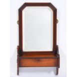 An Edwardian mahogany mirror, with lidded compartment, 73 x 41cm Silvering of mirror slightly