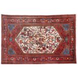 A Persian Toskeran rug, 135 x 212cm