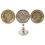 Three brass 'Cairo ware' dishes and a Turkish tinned brass huqqa base, first half 20th c, various