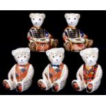 Four Royal Crown Derby seated bear paperweights, Drummer Bear (2), Red Bow Tie, certificate, Blue