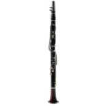 A clarinet, of grenadilla with associated rosewood bell, barrel stamped Howarth & Co Maker London,