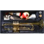 A trumpet, Boosey & Hawkes Besson 600, with mouthpieces, three mutes and music rest, cased