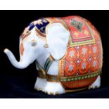 A Royal Crown Derby Baby Elephant paperweight, commissioned by Mulberry Hall, numbered 339/950,
