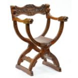An Italian renaissance style carved walnut armchair, decorated with grotesques Good condition