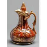 A Rockingham decorated brown glazed and gilt ale jug and stopper, Isaac and Alfred Baguley, c1842-