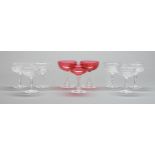 A set of six English cut glass champagne saucers, early 20th c and a contemporary set of three,