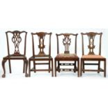 A pair of George III fruitwood dining chairs, one other of mahogany and another of later date Some