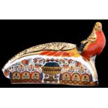 A Royal Crown Derby Golden Pheasant paperweight, The 250 Collection, certificate and box