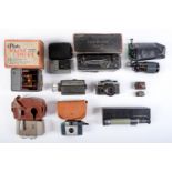 A Rajar quarter plate folding pocket camera, early 20th c, original card box and several other still