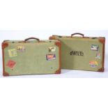 Two leather trimmed green canvas suitcases, second quarter 20th c, 66cm l Both in fair condition for