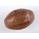 Sport. A miniature stitched leather Gilbert rugby ball, early 20th c, signed by J M B Stuart and two