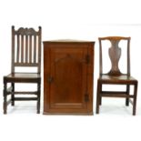 A Queen Anne oak chair, the lath back with carved ears, boarded seat, seat height 47cm, an oak