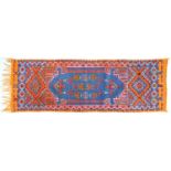 A Moroccan rug, a Baluch grain bag and a Turkish silk rug, 202 x 72cm, 112 x 64cm and 85 x 55cm