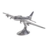 A cast aluminium model of a stylised four-engine turbo-prop aeroplane, wingspan 55cm Good condition