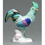 A Herend model of a rooster, green fishnet design, 14cm h, blue printed mark HEREND HUNGARY