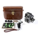 A Paillard Bolesc D8L cine camera, with accessories and instruction manual, maker's leather case