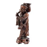 A Chinese rootwood figure of a fisherman, 19th/early 20th c,  with glass eyes, 37cm h Dusty but