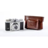 An Agfa Silette 35mm camera, No HM 2705, leather case Wear to plated finish on lens mount