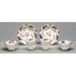 A pair of Rockingham trios, c1838-42, of single spur handle shape, painted with a central group of