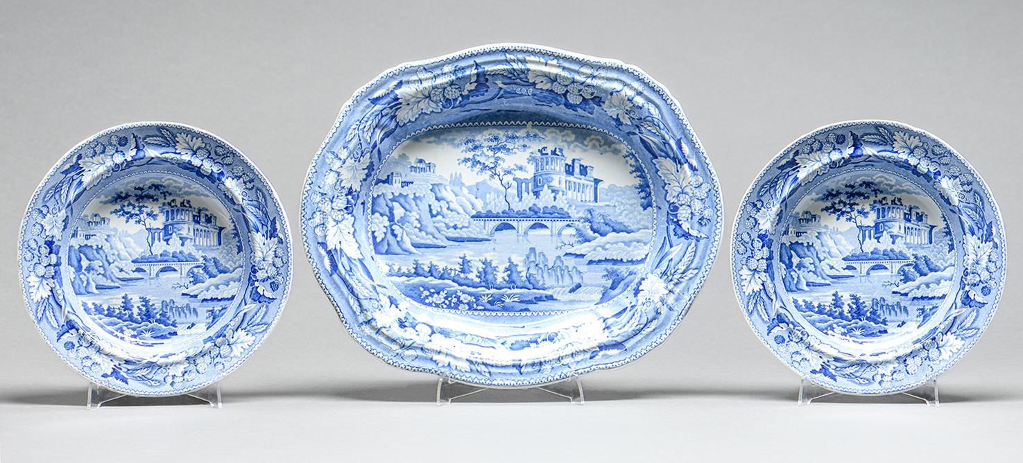 A Minton blue printed earthenware Italian Ruins pattern dish and two soup plates, c1825, dish 37.