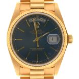 A Rolex 18ct gold gentleman's wristwatch, Oyster Perpetual Day-Date, with blue dial, 34mm diam