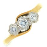 A three stone diamond ring, gold hoop marked 18ct PLAT, 3.4g, size O½ ConditionGood condition