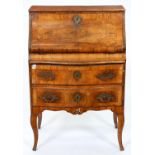 An Italian walnut bureau, c1760, crossbanded throughout, the figured, quarter veneered serpentine